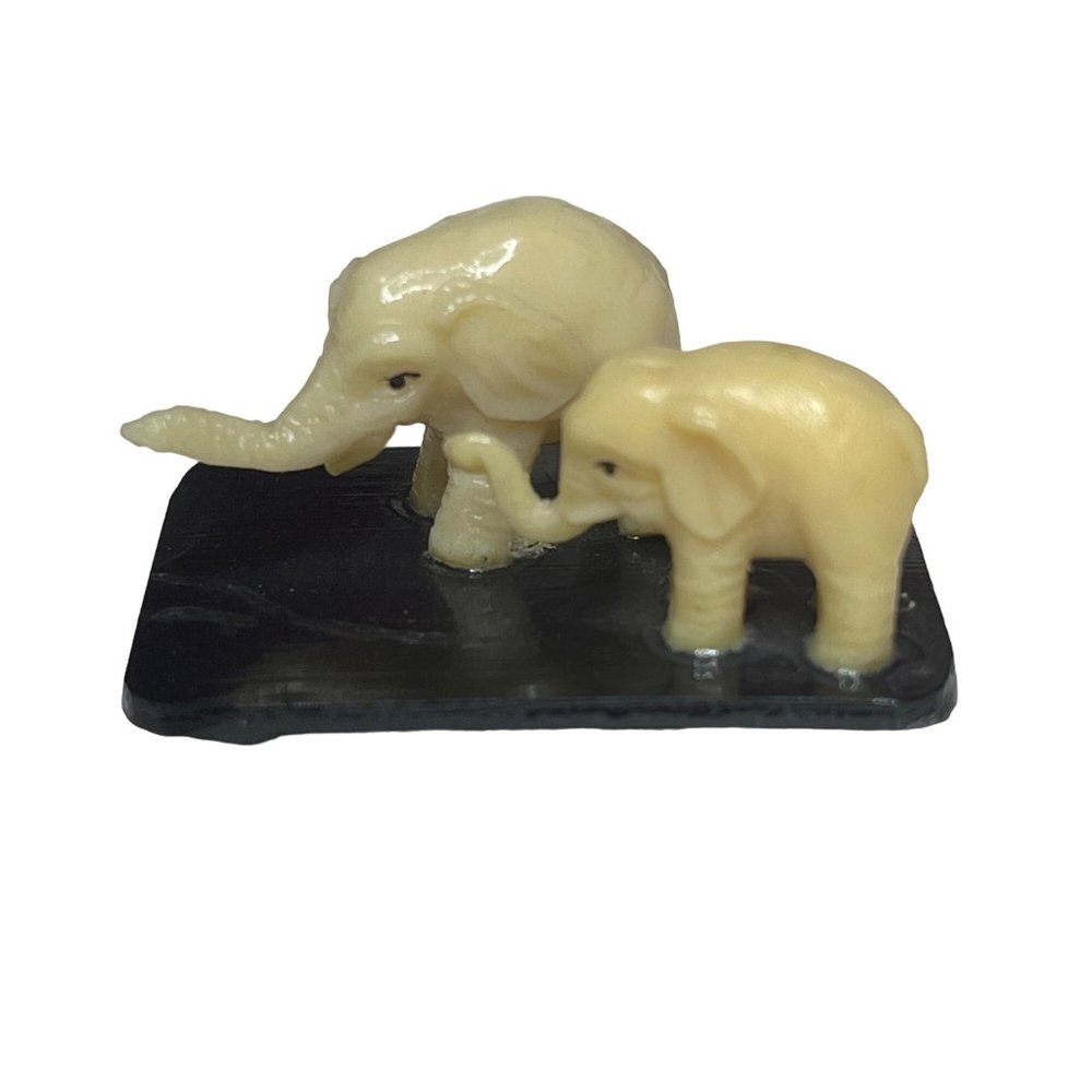Vintage Celluloid Elephant Figurine 2 Elephants on Black Stand Trunks Up